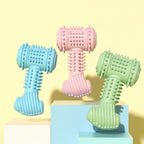 Three colorful dog toys on a light yellow background with text in Chinese.
