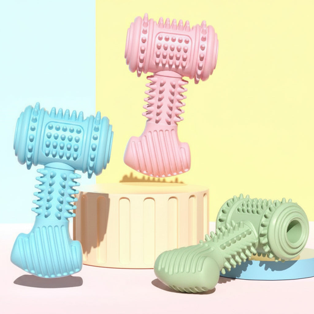 Three colorful dog toys with textured surfaces on a light yellow background.