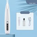 Electric toothbrush with cleaning brush, oil, and USB cable on a blue background