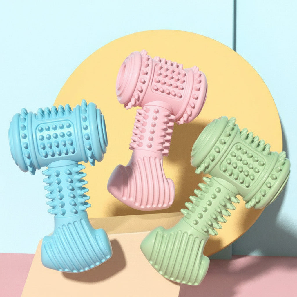 Three colorful dog toys shaped like hammers on a yellow background with text in Chinese.