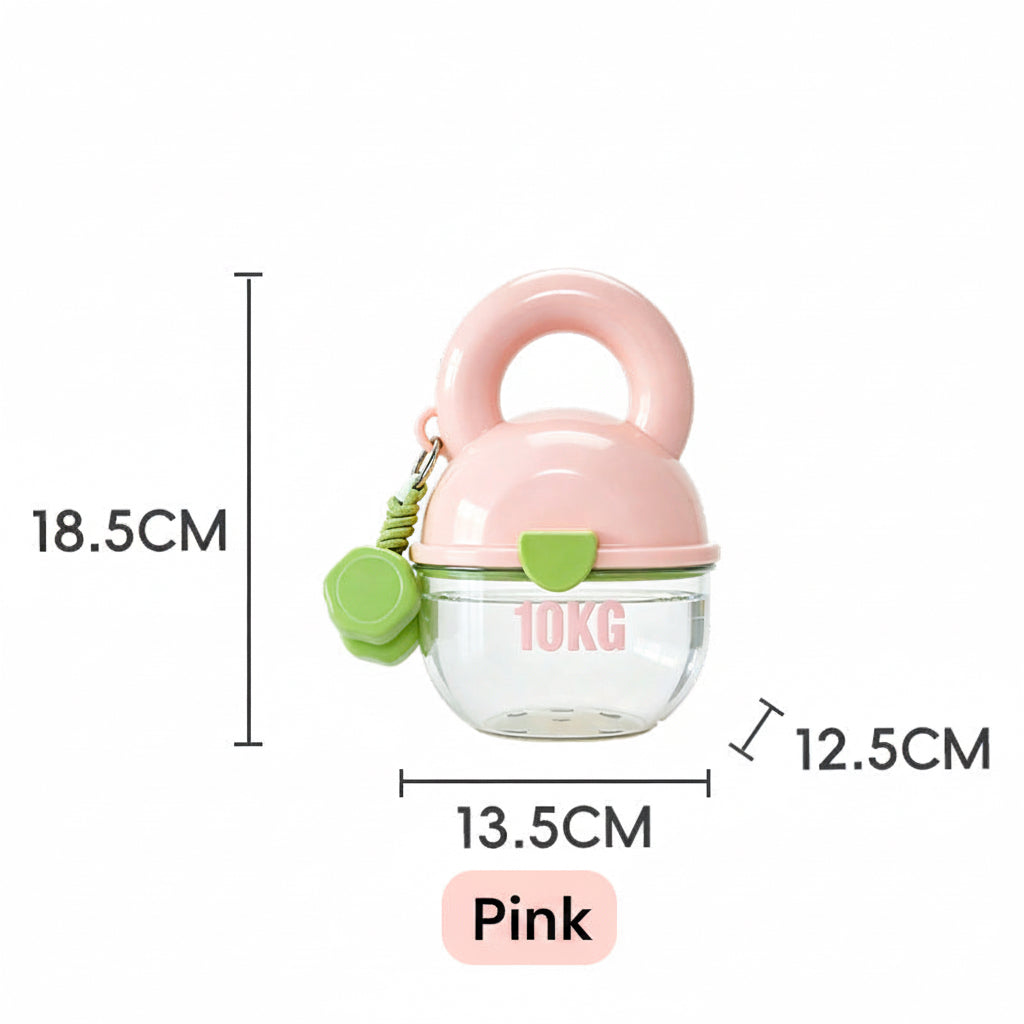 Pink and green baby rattle with measurements on a white background